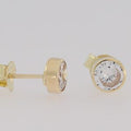 9ct yellow gold 5mm round cubic zirconia tube set studs.