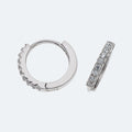Silver 1.5mm x 9mm cubic zirconia huggies.