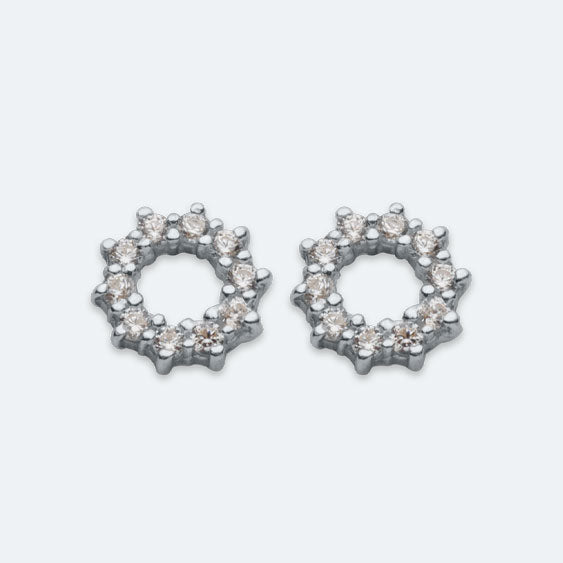 Silver cut out cubic zirconia circle studs.