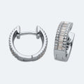Silver cubic zirconia huggies.