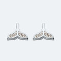 Silver whale tail studs with cubic zirconia's